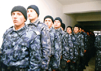 Romanian gendarmerie lined up at the building