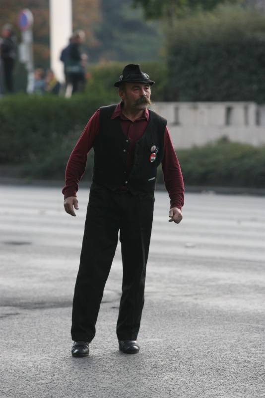 Portrait of the protester in traditional vest and hat