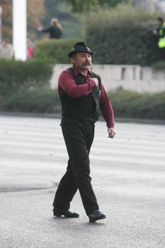 The protester walking across the street